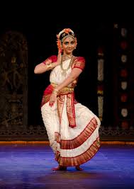 Kuchipudi dancer in traditional costume performing a classical Andhra Pradesh dance pose